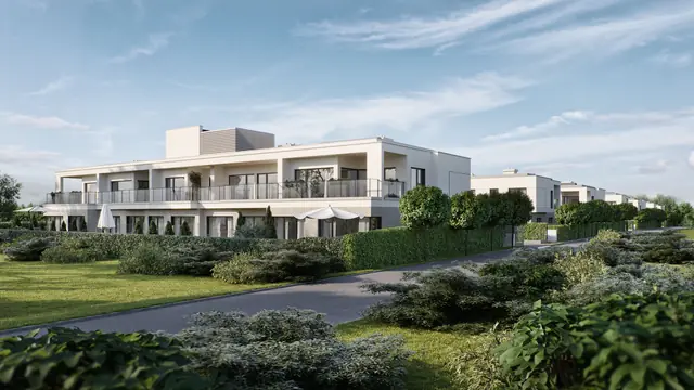 Osiedle GreenVille — szeregowe budynki dwulokalowe wśród zieleni, widok od strony wjazdu